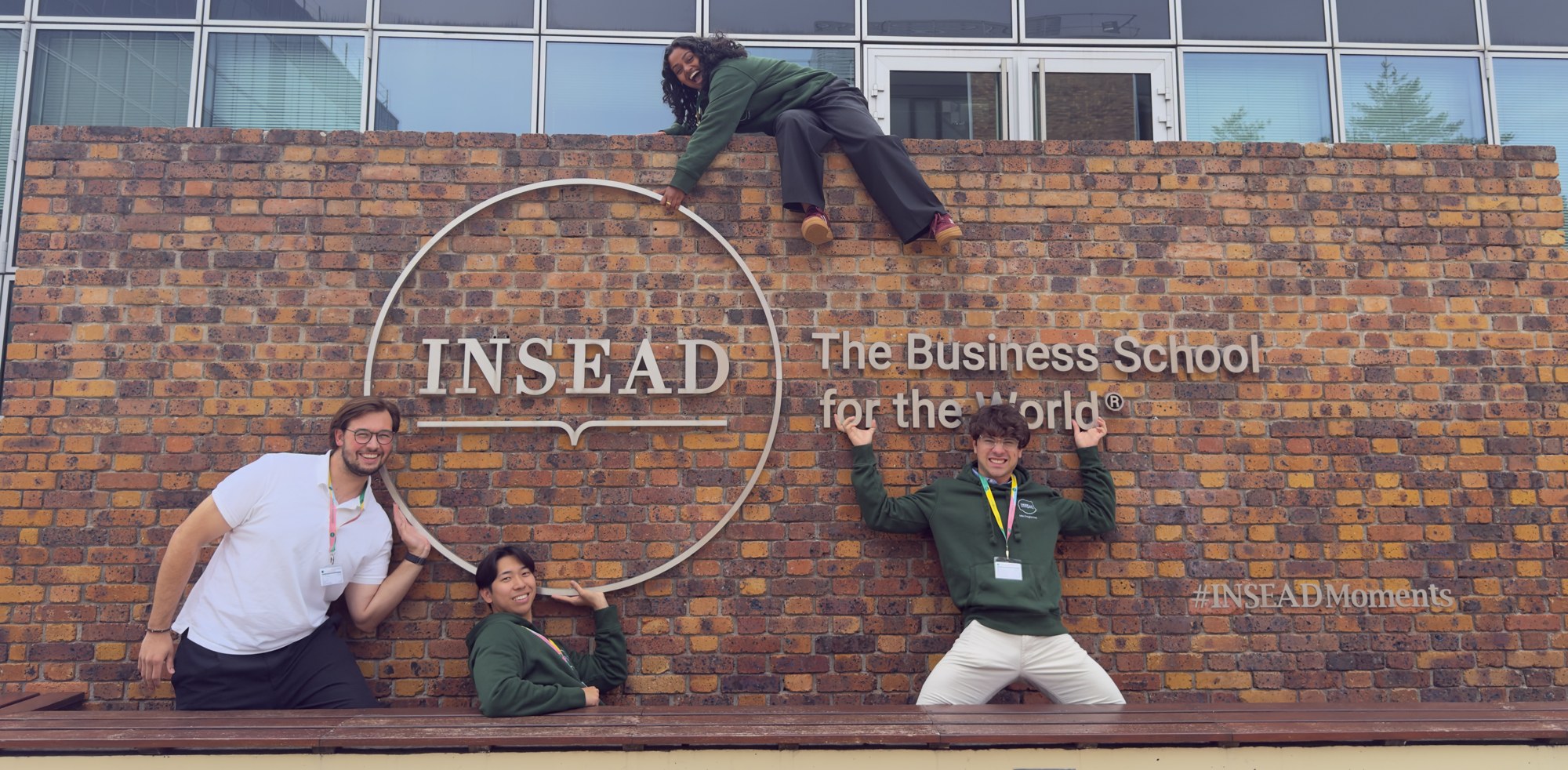 Tim, Kirtana, Kimi and Constantine together at the INSEAD sign in Fontainebleau